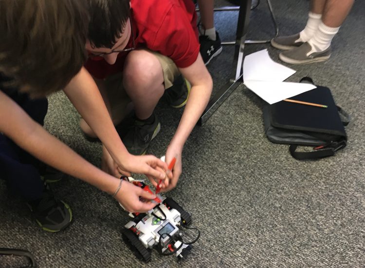 photo of students working on robotics project