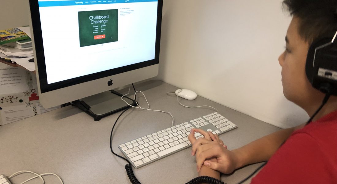 photo of student on computer